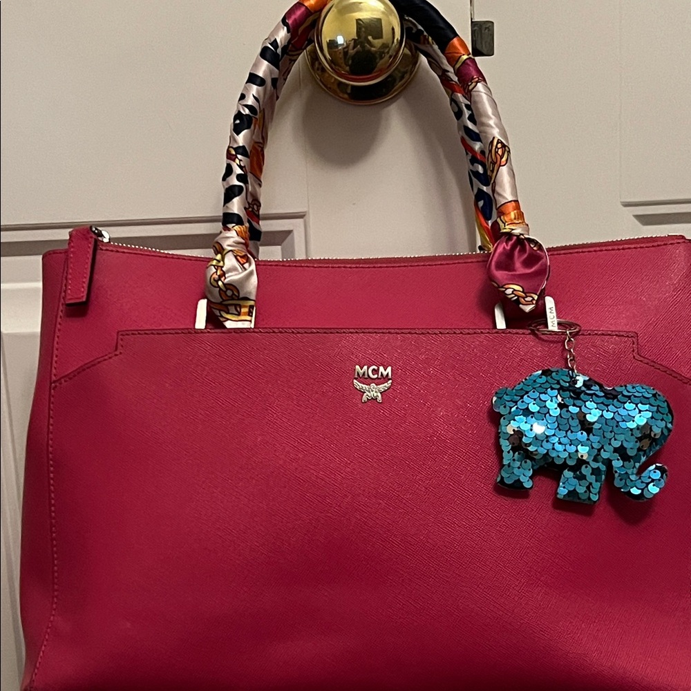 MCM Pink Tote Bag: Visible wear and damage